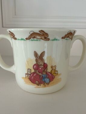 BUNNYKINS Children Bunny Double-Handled Mug in Cream with Pink & Blue Motif